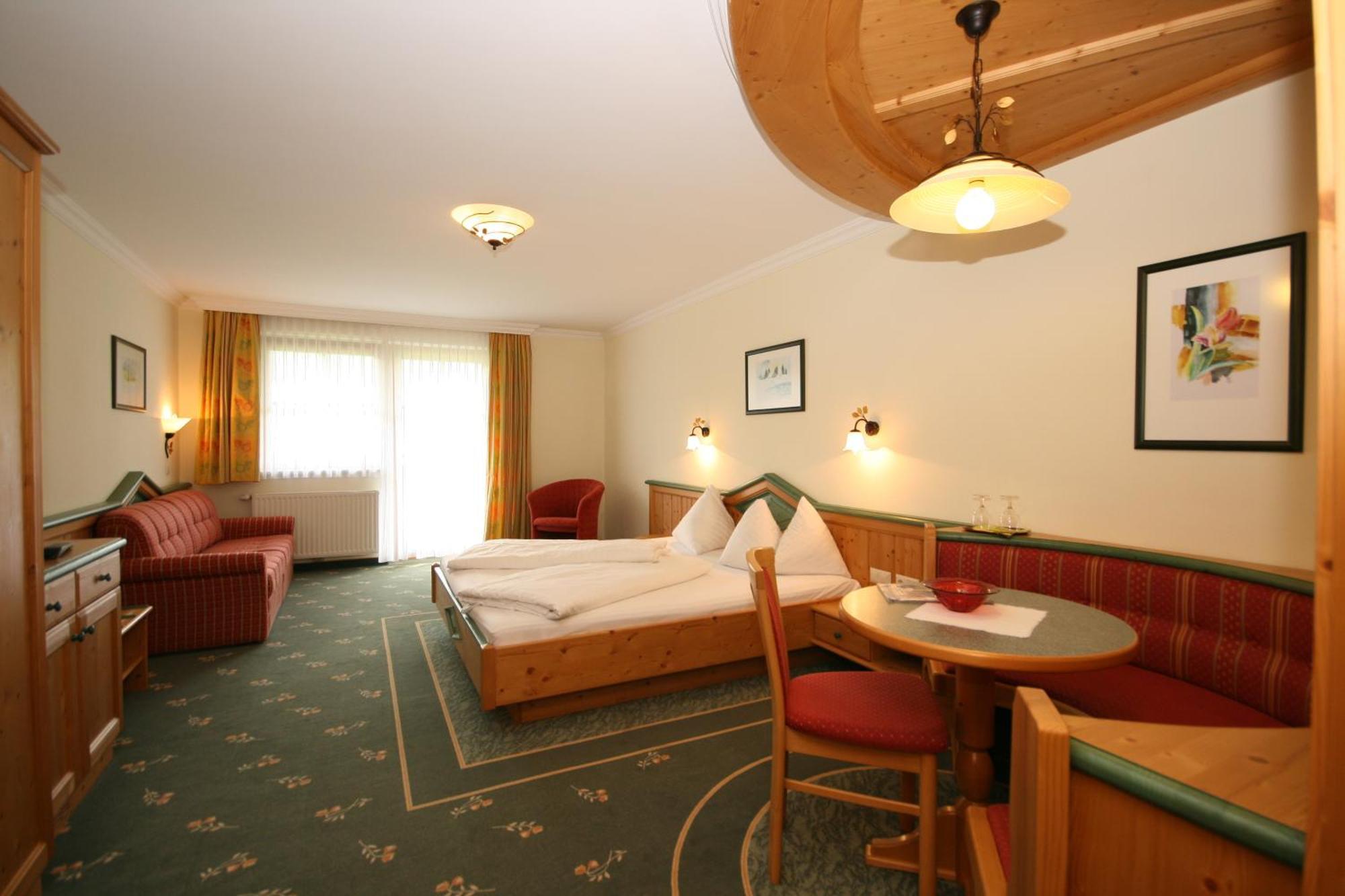Alpenhotel Neuwirt Шладминг Номер фото