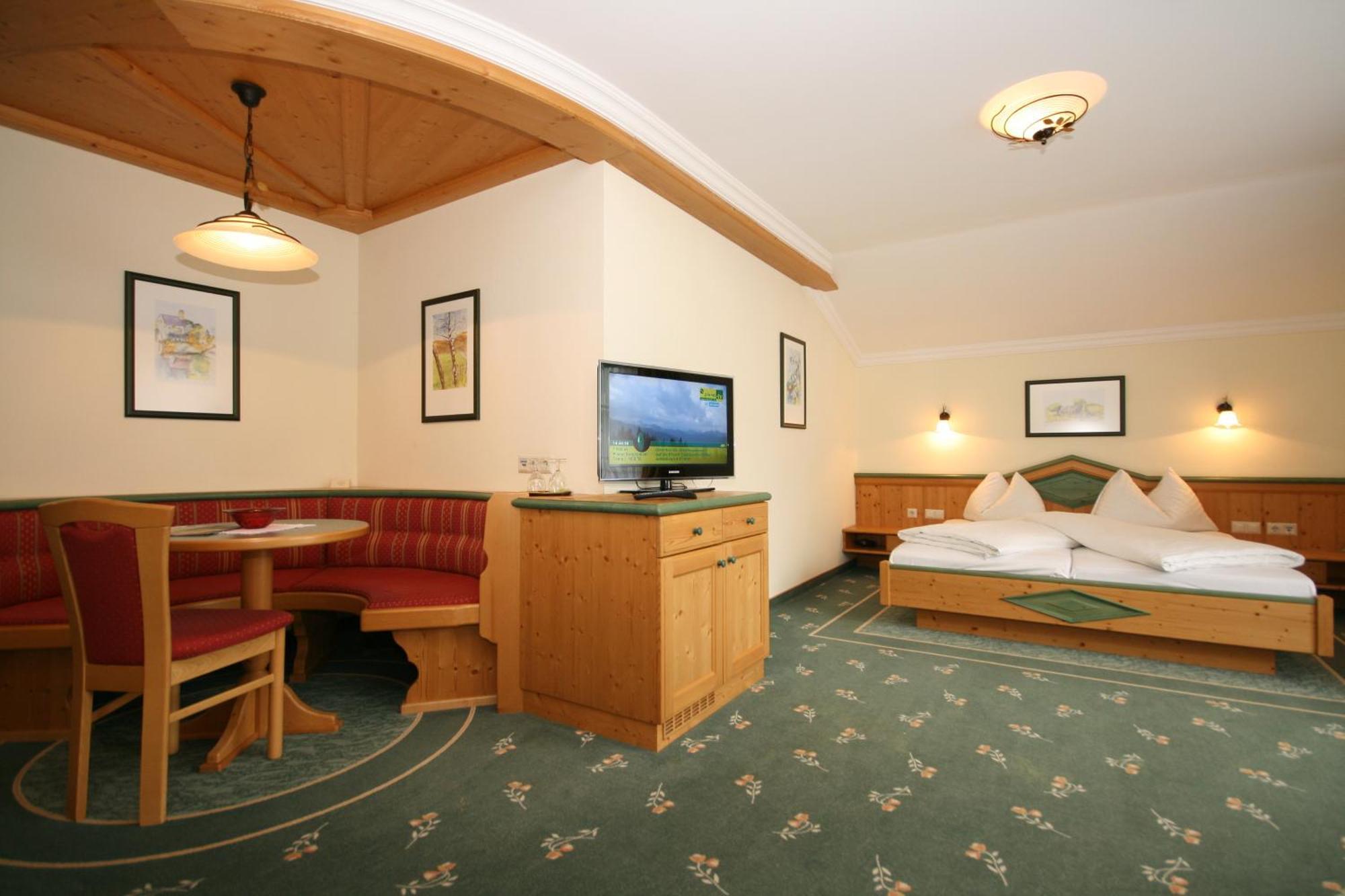Alpenhotel Neuwirt Шладминг Номер фото